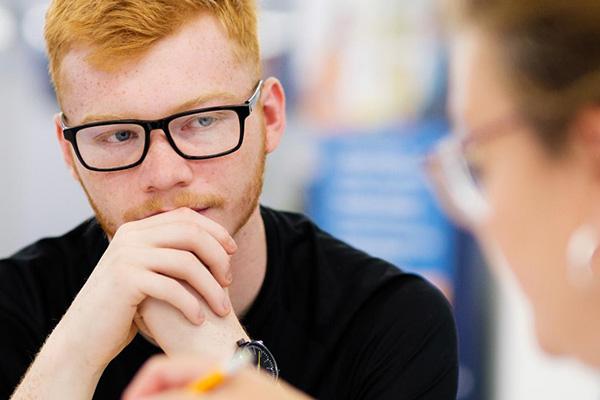 Young person having a conversation